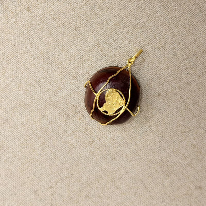 pendentif grains de tonnerre avec de Guyane